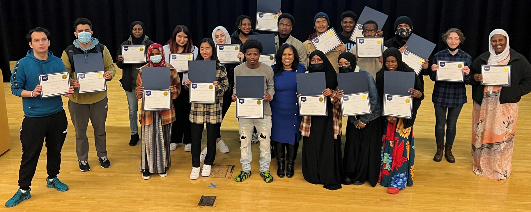 EOP students pose for a group photo after receiving their certificates.