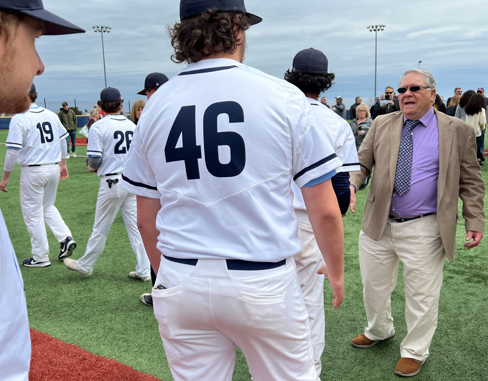 Before the ceremony current players lined up and thanked Antonio for his dedication to OCC's Baseball program.