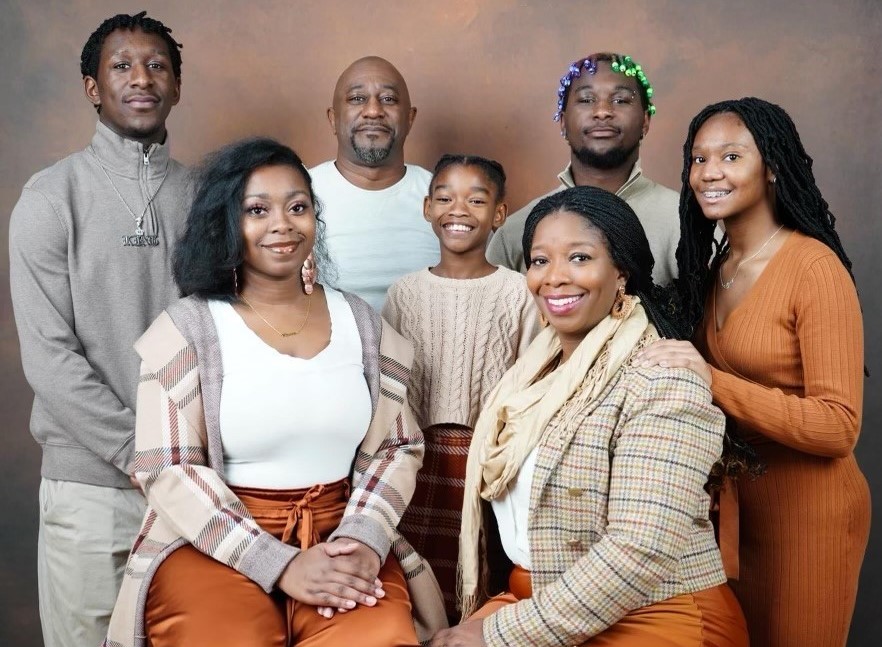 The Albright Family (front row left to right): Patricia, Azalea, and Keturah; (back row left to right) Kerrick, Tyrone, Josiah, and Olivia.