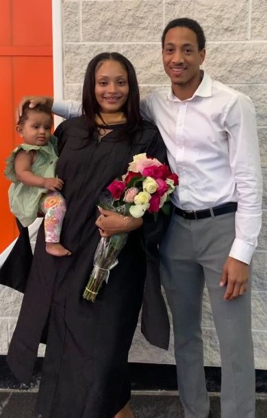 Homer (center) is pictured after her graduation from SU along with Marley (left) and Webb (right).