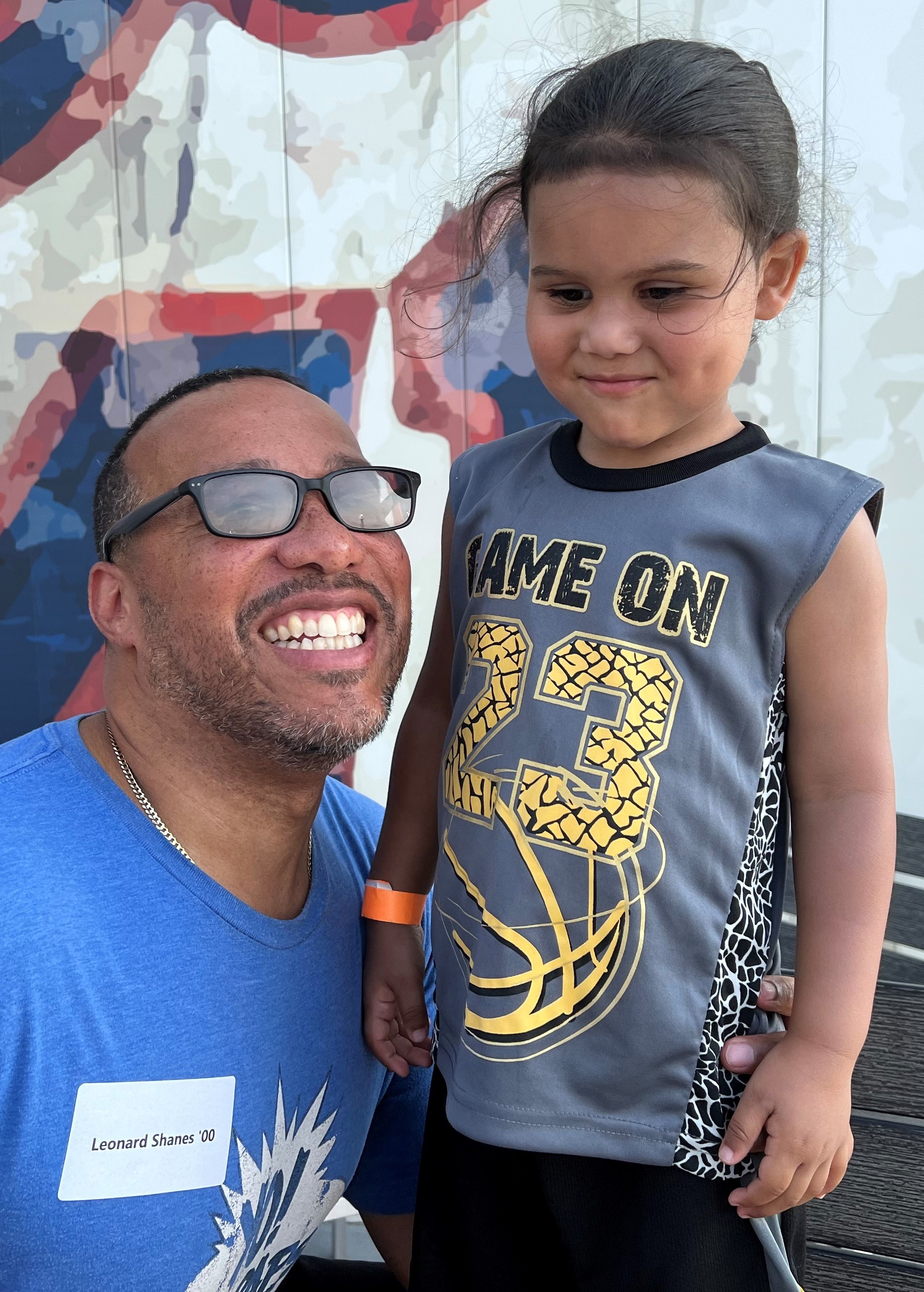 Leonard Shanes '00 with his grandson Adonis.