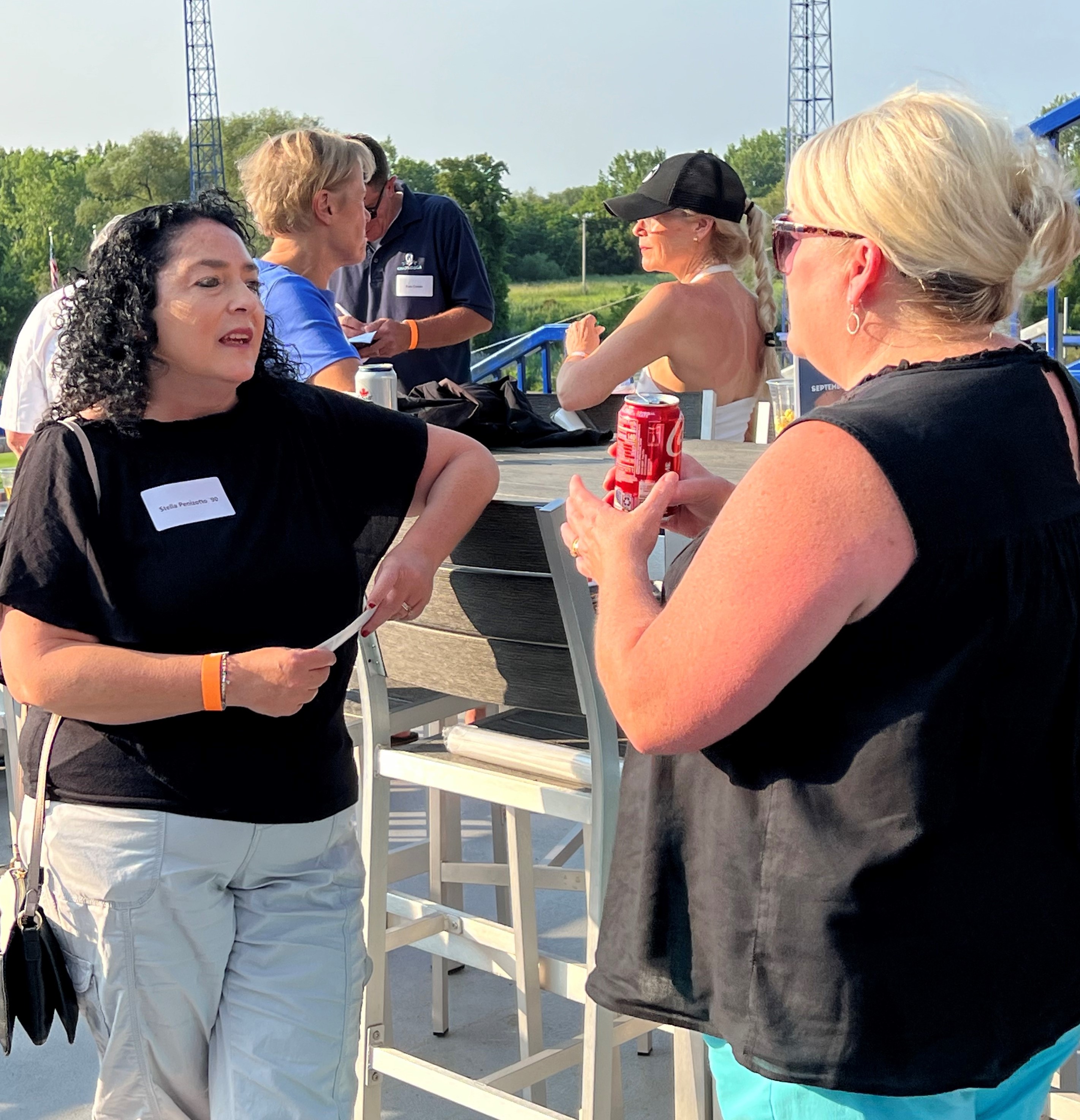 Stella Penizotto '90 (left) and the OCC Foundation's Steff Williams (right).