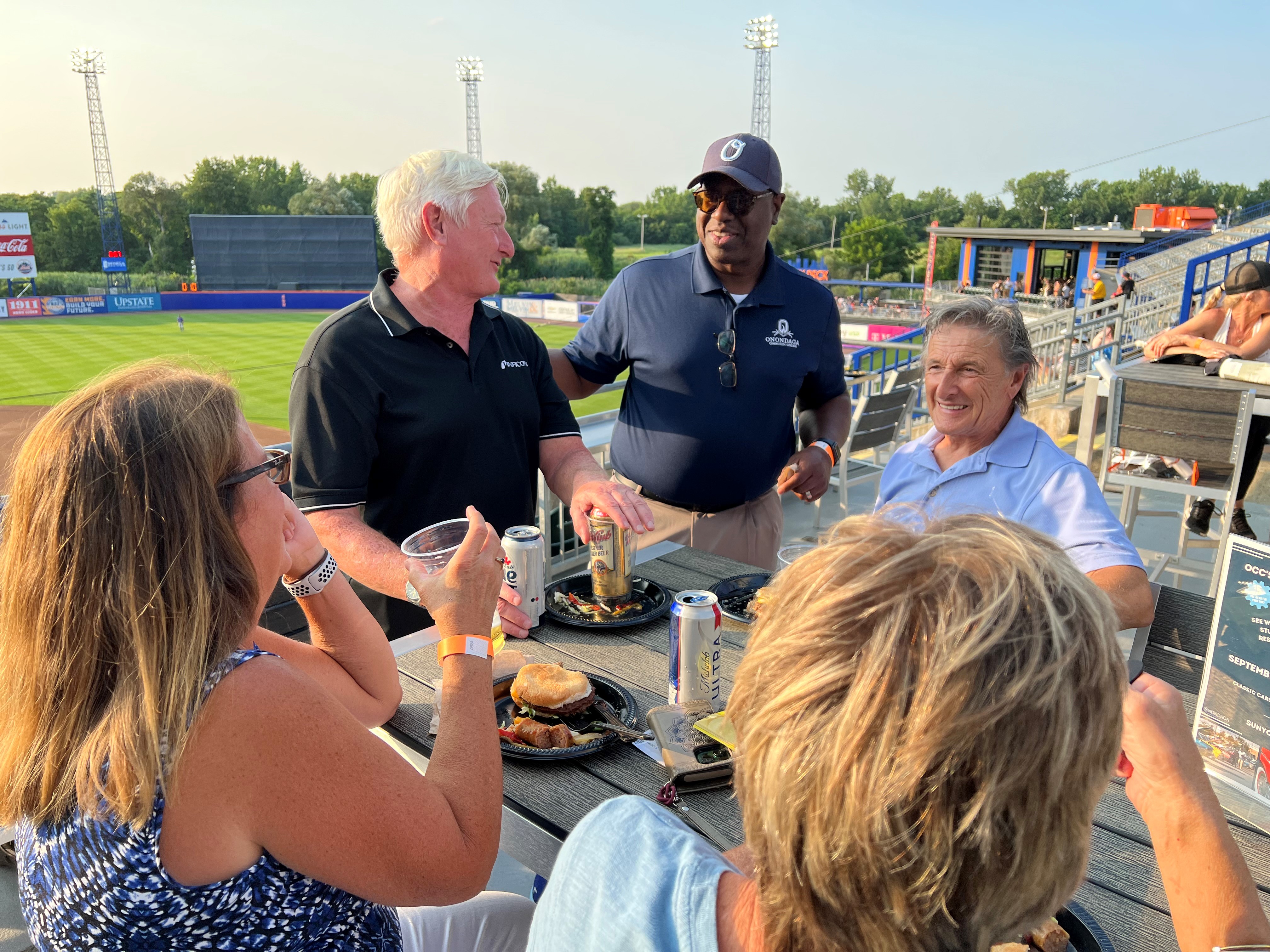 OCC President Dr. Warren Hilton with (left to right) Kathleen Schill '81 & '03, Steve Scholl '78, Ronald Yencha '75 and Lynn Yencha.