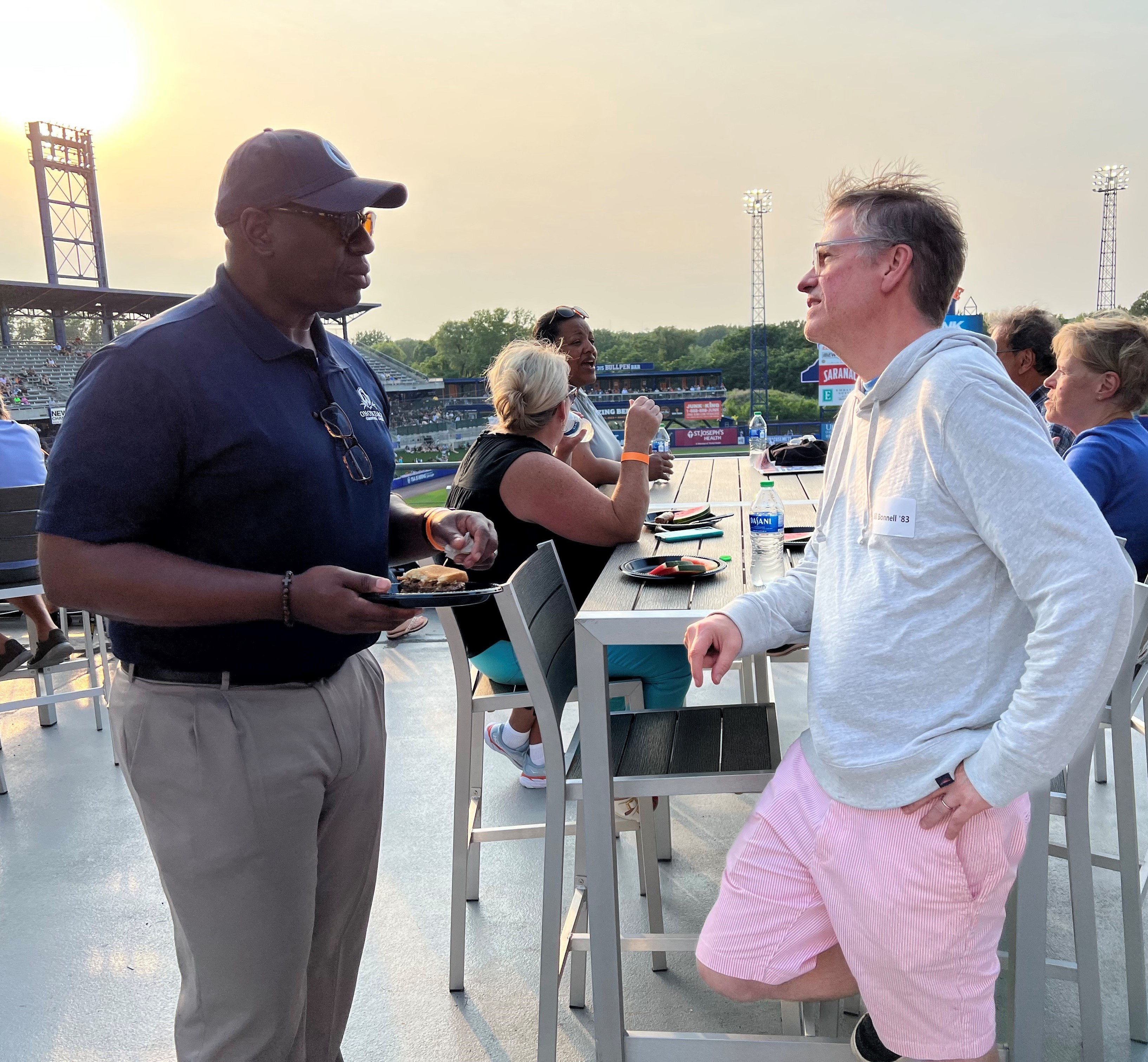 OCC President Dr. Warren Hilton (left) and Bill Bonnell '83 (right).